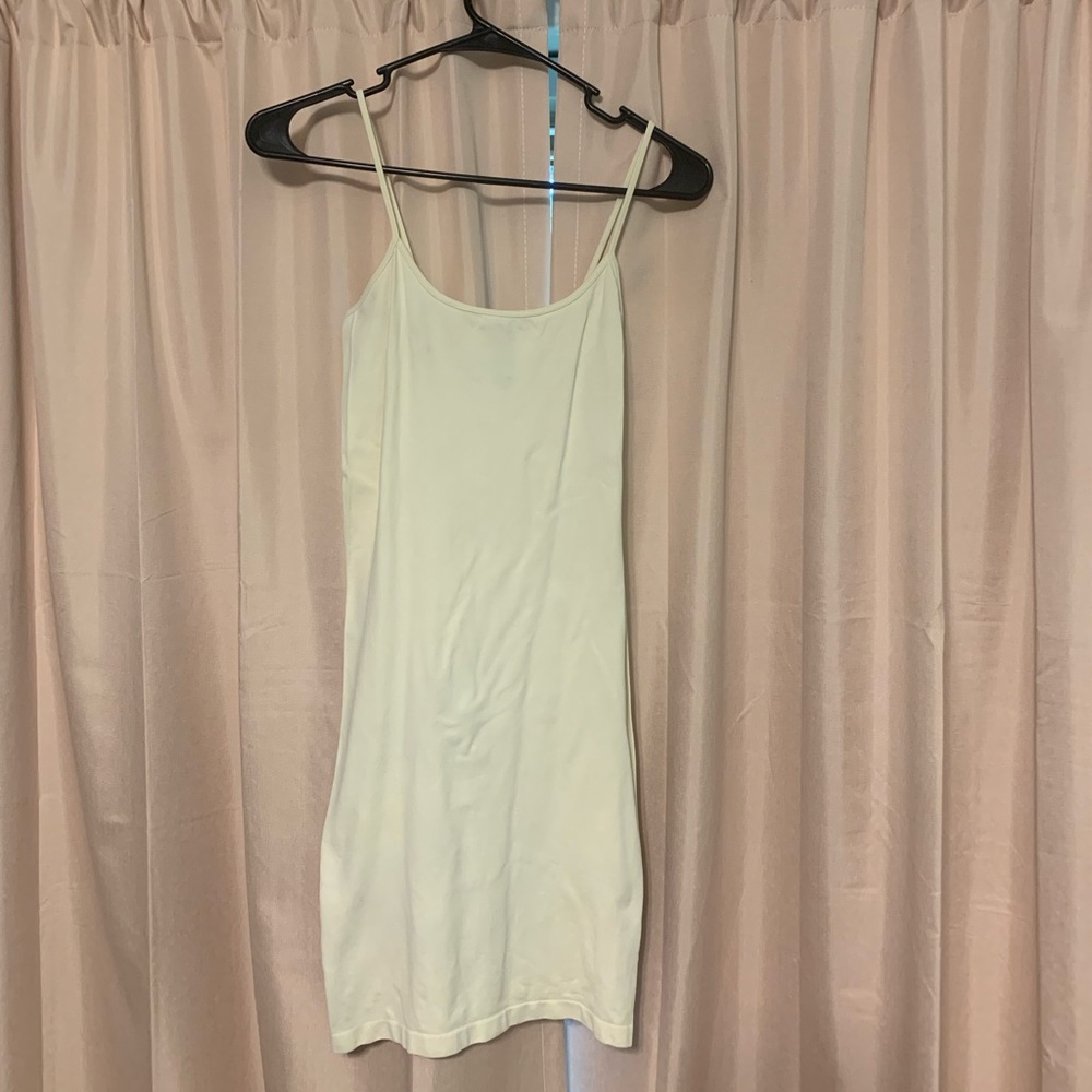Bodycon dress slip so everything doesnt show through that cute outfit. One size